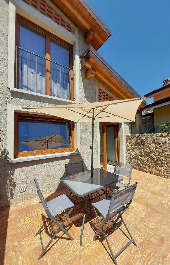 Our Happy Place - Casa Vacanze Per Il Viaggiatore Slow 曼代洛-德尔拉里奥 外观 照片